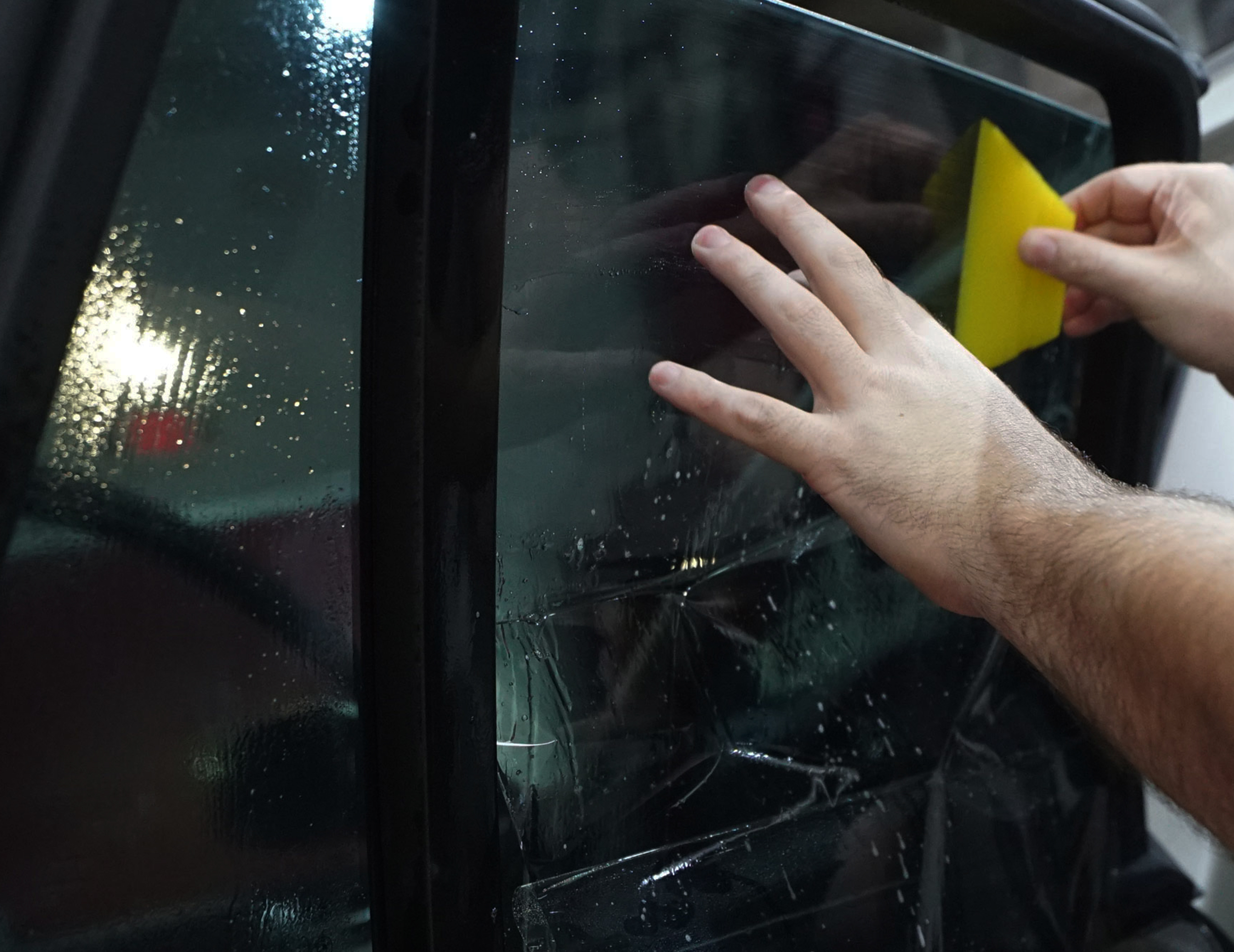 Applying window tint film